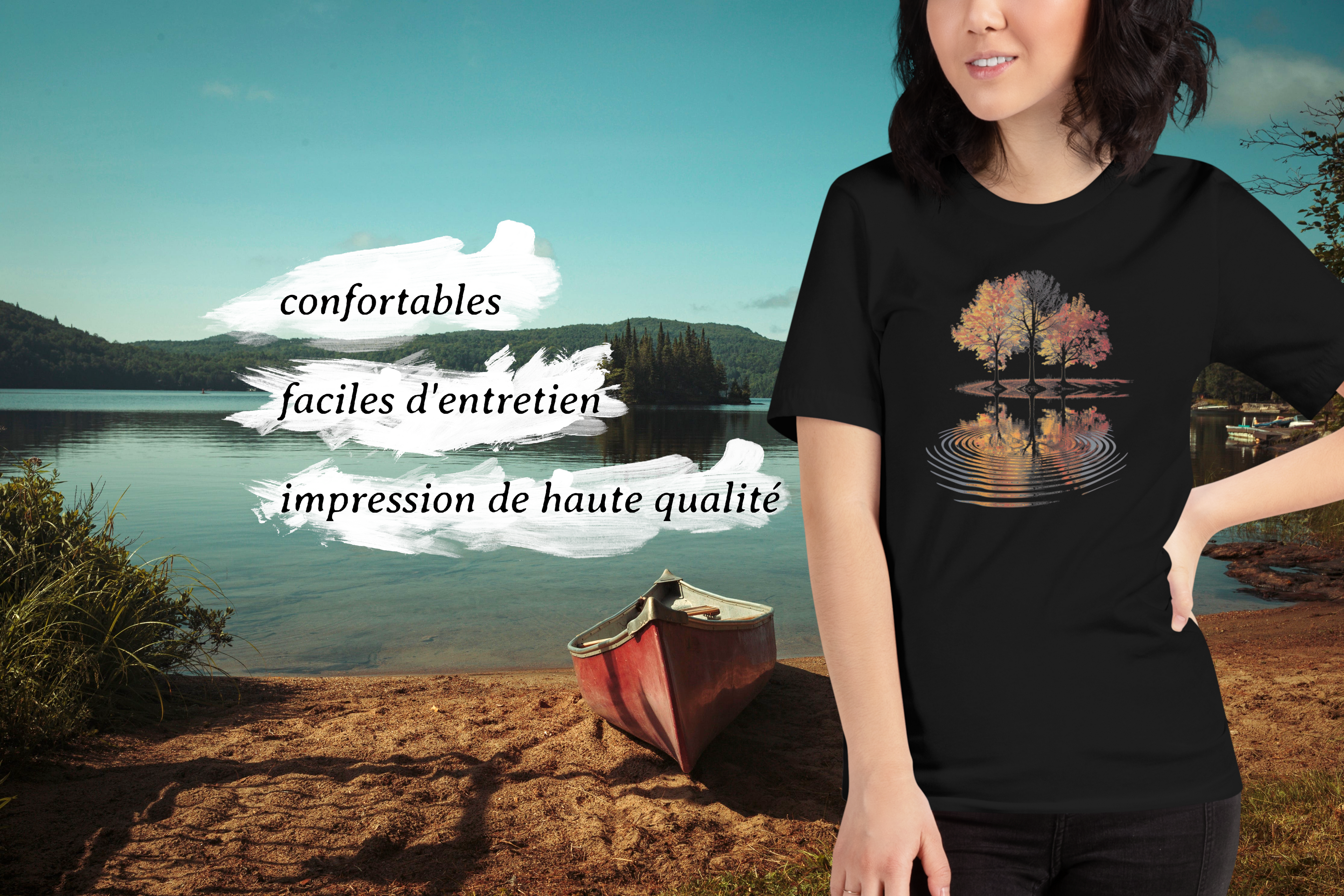 Une femme portant un t-shirt québécois Empreinte Nordique devant un lac avec un canot. T-shirts confortables, faciles d'entretien, et fabriqués avec une impression de haute qualité.